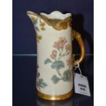 A Royal Worcester blush ivory porcelain jug, decorated with handpainted foliate panels,
