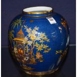 A Carlton ware Mikado vase, of oviform shape, decorated with foliate panels, on blue ground,