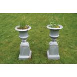 Pair of Regency cast iron urns on bases Worldwide shipping available: shipping@sheppards.ie