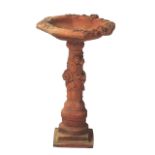 Terracotta stemmed bird bath 65 cm. highwith raised floral and leaf decoration

Worldwide shipping