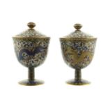 Pair of nineteenth-century Chinese cloisonné urns and covers Each with dragon decoration 19 cm high