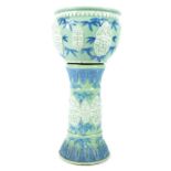 Nineteenth-century Chinese porcelain jardiniere on stand  celadon glazed, with raised blue and white