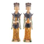 Pair of Chinese Sancai glazed figures  Each 20 cm. high