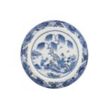 Large eighteenth-century Chinese blue and white charger depicting figures in a garden  55 cm