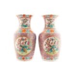 Pait nineteenth-century Chinese polychrome vases each with painted cartouches depicting cockerel and