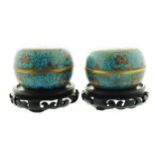 Pair Chinese cloisonne paste jars and covers each raised on a hardwood base 12 cm. diameter; 8 cm.