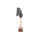 Mounted horse on a tapered plinth Worldwide shipping available: shipping@sheppards.ie 175 cm.