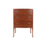 Small Edwardian period mahogany bow front chest of three drawers, furnished with brass scroll