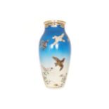 Japanese early twentieth-century vase decorated with birds flying amongst blossoms Worldwide