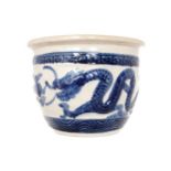 Twentieth-century Chinese blue and white dragon decorated terracotta jardinière Worldwide shipping