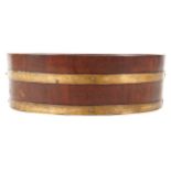 Nineteenth-century oval brass bound log barrel Worldwide shipping available: shipping@sheppards.ie