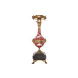 Nineteenth-century French ormolu mounted porcelain lamp raised on a marble base terminating on brass