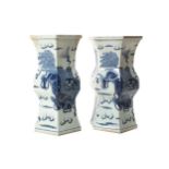 Pair of early twentieth-century Chinese blue and white pedestals each decorated with kilin amongst