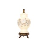Floral glazed glass vase-shaped lamp raised on a pierced dolphin supported vase Worldwide shipping