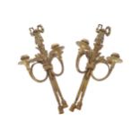 Pair of nineteenth-century French brass appliques each of two scroll arms supporting lights