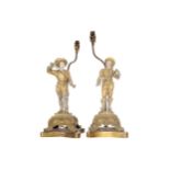 Pair of nineteenth-century parcel gilt and painted spelter figure stemmed table lamps Worldwide