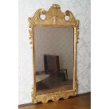NINETEENTH-CENTURY CARVED GILTWOOD FRAMED PIER MIRROR the rectangular plate with rounded corners