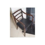 REGENCY PERIOD MAHOGANY DESK CHAIR the reeded ladder back above a leather stuff-over seat, between