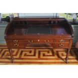 LARGE REGENCY PERIOD MAHOGANY TAMBOUR CYLINDER TOP WRITING DESK opening to a fitted tooled leather