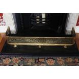 REGENCY PIERCED BRASS FENDER raised on claw feet Direct all shipping enquiries to shipping@