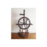 NINETEENTH-CENTURY SPINNING WHEEL Direct all shipping enquiries to shipping@sheppards.ie 80 cm.