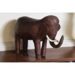 LEATHER ELEPHANT Direct all shipping enquiries to shipping@sheppards.ie 46 cm. high; 70 cm. long