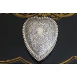 SILVER JEWELLERY BOX of heart shape with overall embossed C-scroll and lattice decoration ,