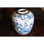 LARGE QING PERIOD BLUE AND WHITE CRACKLED GLAZED BALUSTER JAR decorated with birds amongst blossoms,