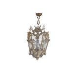 BRASS HALL LANTERN of tapered form with engraved glass panels, below floral drapes Direct all