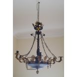 LARGE REGENCY PERIOD GILT BRONZE SIX-BRANCH CHANDELIER of scrolled arms emanating from a suspended