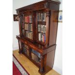 WILLIAM IV PERIOD MAHOGANY BOOKCASE the superstructure with a moulded and panelled crown, above a