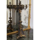 PAIR OF NINETEENTH-CENTURY PARCEL GILT BRONZE CANDELABRAS each of six-scroll arms, supporting candle