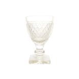 EARLY NINETEENTH-CENTURY IRISH PENROSE GLASS CHALICE SHAPED VASE the body decorated with raised