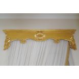 PAIR OF CRAVED GILTWOOD PELMETS each centred by a scallop shell Direct all shipping enquiries to