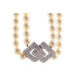 ﻿TWO ROW CULTURED PEARL NECKLACE ﻿mounted with a geometric diamond clasp Direct all shipping