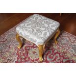 NINETEENTH-CENTURY LOUIS XV STYLE STOOL the square upholstered seat above a serpentine apron, raised