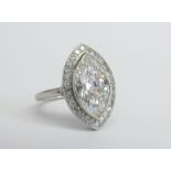 3.01 CT., F COLOUR, VS1 CLARITY, GIA CERTED DIAMOND RING with an outer diamond border, mounted in