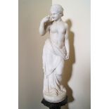 NINETEENTH-CENTURY ITALIAN SCHOOL Venus with a dove on her shoulder, white marble sculpture Direct