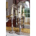 PAIR OF NINETEENTH-CENTURY WALKER & HALL SHEFFIELD PLATED CANDLESTICKS each of ribbed baluster form,