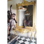 ﻿MONUMENTAL NINETEENTH-CENTURY CARVED GILTWOOD CONSOLE TABLE AND CARVED GILTWOOD AND GESSO FRAMED