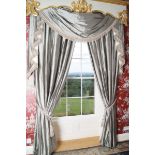PAIR OF SILK SWAG DRAPED CURTAINS Direct all shipping enquiries to shipping@sheppards.ie 287 cm.