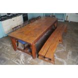 LARGE ANTIQUE PINE KITCHEN TABLE AND MATCHING BENCH the rectangular planked top, raised on square