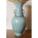 CHINESE MING PERIOD CELADON CRACKLE GLAZED VASE of baluster form with elephant trunk handles and