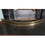 IRISH EIGHTEENTH-CENTURY BOWED PIERCED BRIGHT-CUT FENDER with urn decoration Direct all shipping