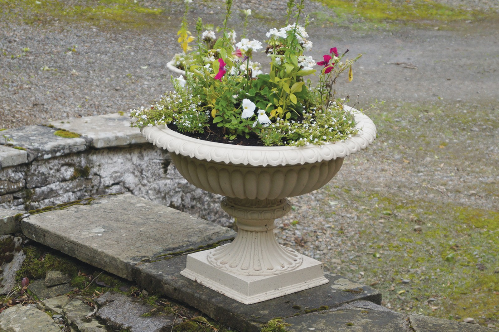 ﻿PAIR OF NINETEENTH-CENTURY CAST-IRON VASE SHAPED JARDINIÈRES Direct all shipping enquiries to