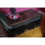 NINETEENTH-CENTURY BRASS AND LEATHER BOUND TRUNK the rectangular top opening to reveal a storage