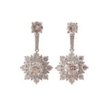 ﻿PAIR OF DIAMOND DROP CLUSTER EARRINGS ﻿set with 6 cts. of diamonds, in 18 ct. white gold Direct all