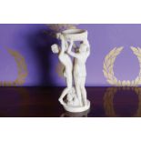 ﻿PARIAN GROUP OF THREE NYMPHS  ﻿holding a flower encrusted ribbed bowl Direct all shipping enquiries