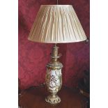 PAIR OF NINETEENTH-CENTURY FRENCH ORMOLU MOUNTED AND PORCELAIN TABLE LAMPS each with a parcel gilt