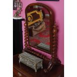 NINETEENTH-CENTURY MAHOGANY CRUTCH-MIRROR the rectangular plate with an arched top, within a round-